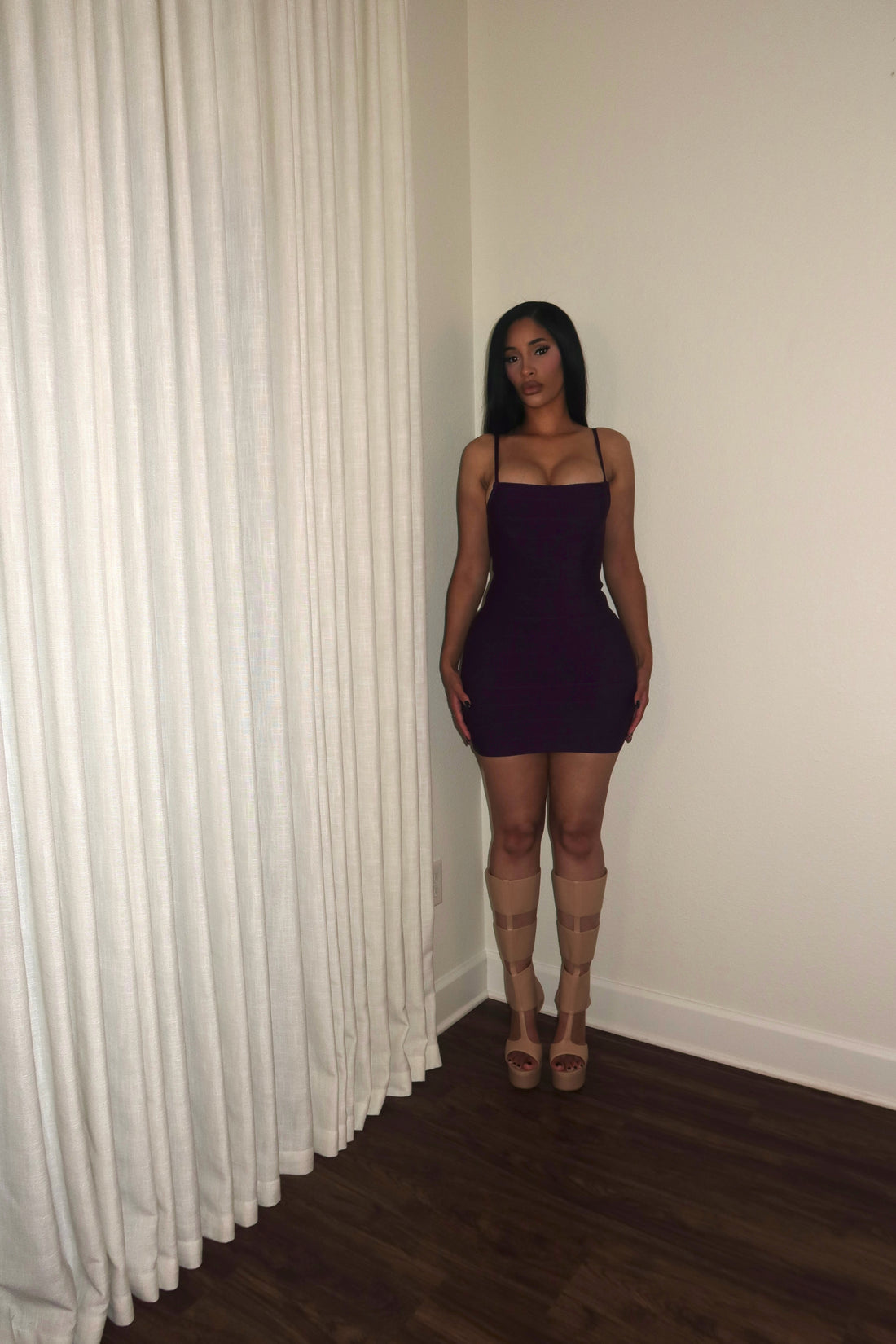 In deep bandage dress